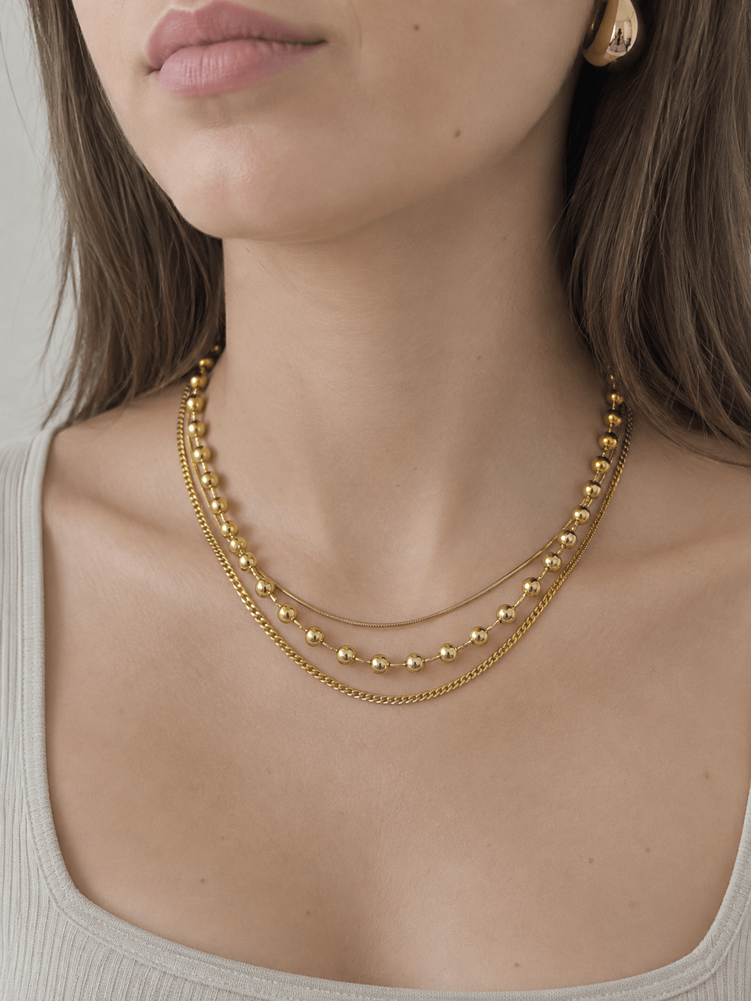 Collana Bubble a Tre Fili Dorata